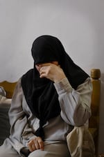 Nidhal, the eldest sister of Shihab's family, cries as she hears about how he was killed. Nidhal says Shihab's death caused them incredible hardship.