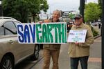 Mark McLeod and Howard Shapiro with the Sierra Club and 350PDX protest the Portland Business Alliance's support for a proposed gas pipeline and terminal.