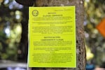 The City of Portland put up notices Monday morning, giving campers until Thursday to move on. Dozens of people have been living in tents, trailers and cars along SW Oak St., next to Portland's Laurelhurst Park, July 26, 2021.