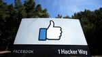 The thumbs up Like logo is shown on a sign at Facebook headquarters in California.