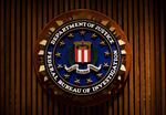 A seal of the FBI reads "Department of Justice Federal Bureau of Investigation"