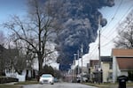 FILE - A black plume rises over East Palestine, Ohio, as a result of a controlled detonation of a portion of the derailed Norfolk Southern trains Monday, Feb. 6, 2023.