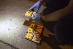 Adam Truitt, 37, owner and founder of Pest Fighter, prepares traps to catch rats in an alley in Seattle's University District on Tuesday October 4, 2016.