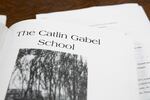 An old yearbook from the Catlin Gabel School is pictured in Portland, Ore., Friday, Feb. 2, 2020. Former students are accusing current and former Catlin Gabel staffers of sexual abuse, providing illegal drugs to minors, and more.