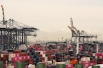 Containers are stacked at the Port of Los Angeles Friday, Feb. 20, 2026, in Los Angeles.