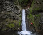 An estimated 40-foot waterfall tumbles into the Valhalla canyon. The crew discovered more than 25 waterfalls in the canyon — some close to 100 feet tall.