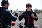 Owen Fortey, 23, gives a thumbs up after completing a safety check at the U.S. Forest Service's national annual rappel crew training event in Bend, Ore., on April 18, 2026.