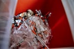 Used syringes, collected by the staff of the Family and Medical Counseling Service Inc. (FMCS), are seen in a container inside the FMCS van in Washington, D.C., on April 21. Several organizations in the U.S. capital are trying to fight the harm caused by fentanyl, an ultra-powerful and addictive synthetic opioid. In 2021, 95 percent of the city's fatal opioid overdoses were fentanyl-related.