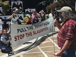 Bob Sallinger of the Portland Audubon Society leads a rally calling for the federal government to stop killing cormorants on the Columbia River.