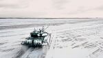 In this photo taken from video and released by the Russian Defense Ministry Press Service on Wednesday, Feb. 2, 2022, a tank drives during a Russian and Belarusian joint military drills at Brestsky firing range, Belarus. Russian and Belarus troops held joint combat training at firing ranges in Belarus Wednesday as tensions remain high under the looming threat of war with Ukraine. The drills involved motorized rifle, artillery and anti-tank missile units, as well tanks' and armoured personnel carriers' crews.