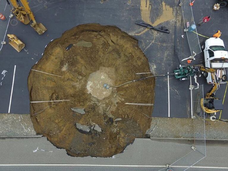 Sinkhole or government conspiracy to hide an alien aircraft? Probably a sinkhole.
