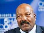 Jim Brown speaks during a press conference after a panel discussion with Bill Russell and Dr. Harry Edwards during a Civil Rights Summit at the LBJ Presidential Library in 2014.