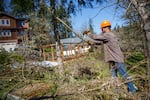 Joshua Wright of Oregon's Wildfire Workforce Corps clears undergrowth in a Eugene community to help reduce the risk of wildfire in the neighborhood, March 30, 2021.