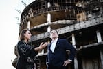 Britain's Prime Minister Andy Burnham reacts as he is shown the rubbles and wreckages left on the buildings and site of a strike by the Lukanivska market in Kyiv, Monday, Aug. 24, 2026.
