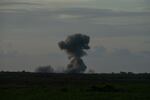 Smoke rises from an air strike on Gaza as seen from Israel's southern border with the Gaza Strip on Thursday, March 7.