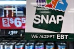 FILE - SNAP EBT information sign is displayed at a gas station in Riverwoods, Ill., Saturday, Nov. 1, 2025.
