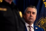 Multnomah County District Attorney Nathan Vasquez listens as Portland Police Bureau Chief Bob Day speaks at a press conference on Nov. 19, 2025 at the Multnomah County Courthouse in Portland, Ore.