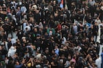 Crowds of pilgrims gather in the area between the two holy shrines in Karbala during Arbaeen