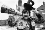 Screaming Lord Sutch, a former pop star who started his own political party but loses his deposit at each election.