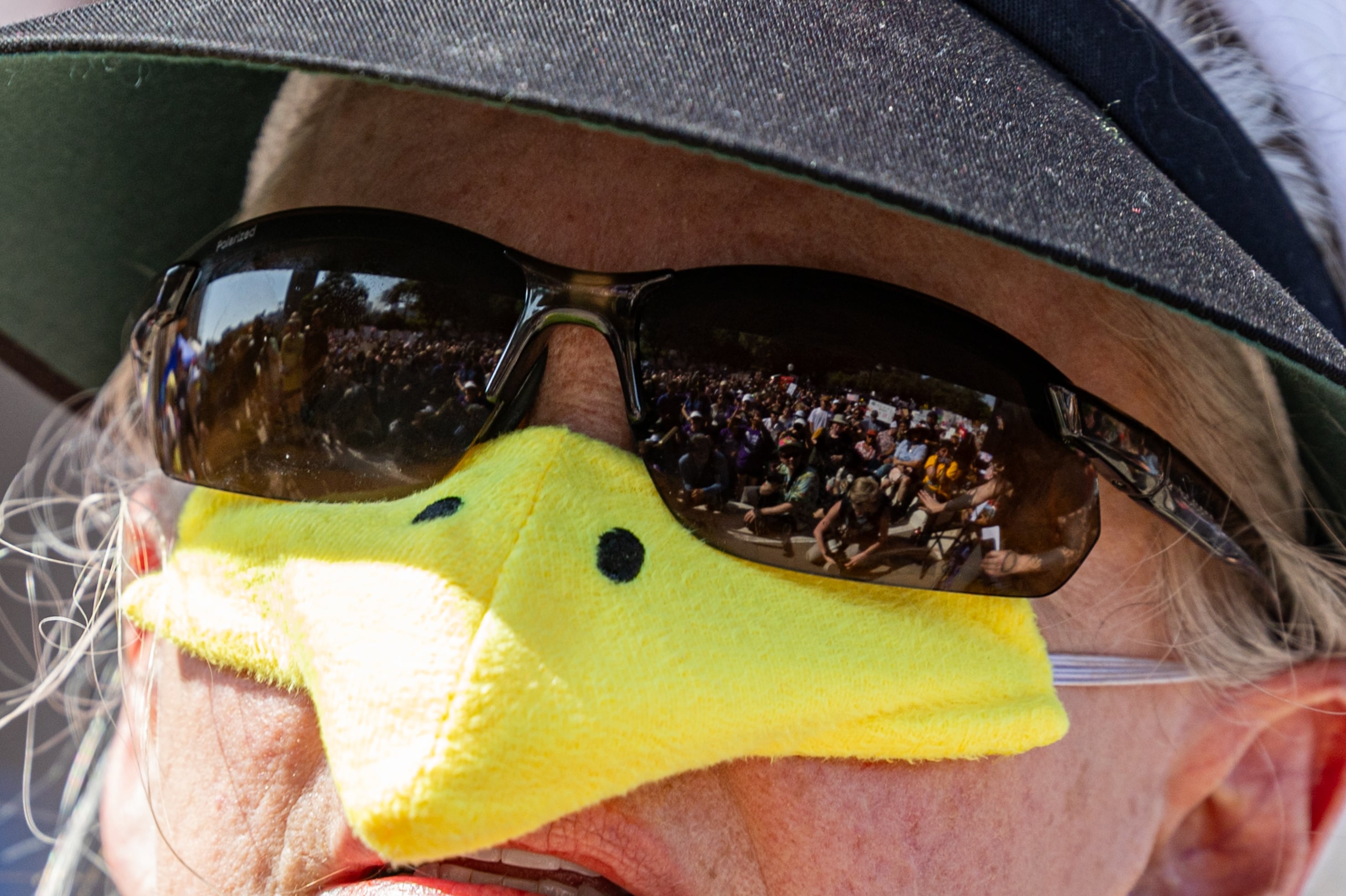 Austin: A woman wears a duck beak during the No Kings protest at the Texas Capitol.