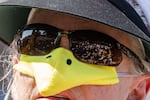 Austin: A woman wears a duck beak during the No Kings protest at the Texas Capitol.