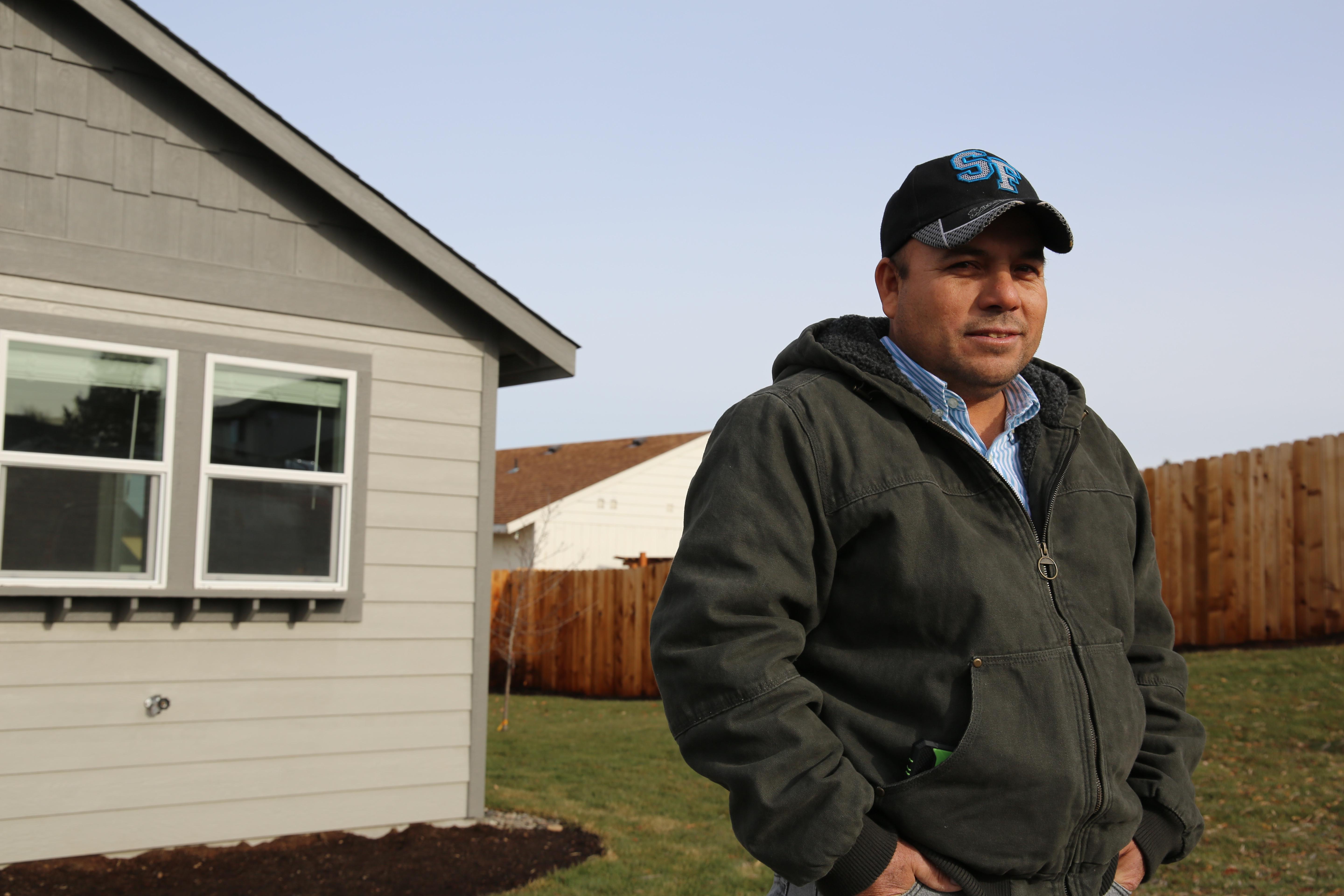 Jose Arzate is proud his son Angel worked on the YouthBuild houses, like the one he now lives in.