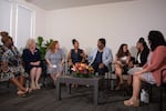 Georgia Democratic gubernatorial candidate Stacey Abrams joins a group of women as they discuss their personal stories of miscarraige at her campaign headquarters in Decatur, Ga. on Aug. 3.