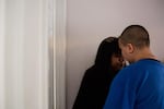 Nikki Putman and her daughter, Jennifer, 12, share a moment to calm down in the hallway of their home in Hillsboro, Ore., Friday, March 1, 2019.