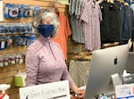 Travel Essentials co-owner Nancy Bestor at her shop in downtown Ashland, Oregon.