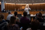 Drag queen Nicole Onoscopi performs a medley of Dolly Parton songs during a pre-gavel ceremony before a Portland City Council meeting at Portland City Hall on Sept. 23, 2025. The performance celebrated the official mayoral proclamation of Sept. 25 (9/25) as Dolly Parton Day, a play on her hit song and movie 9 to 5.