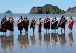 In this undated photo provided by ICT's Mark Trahant, members of the Quinault Indian Nation are pictured on the beach on their reservation in northern Washington.