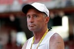 FILE - In this Aug. 21, 2015, file photo, Alberto Salazar watches a training session for the World Athletic Championships at the Bird's Nest stadium in Beijing. Salazar has been permanently banned by the U.S. Center for SafeSport for sexual and emotional misconduct. Salazar has 10 days to appeal the decision. (AP Photo/Kin Cheung, File)