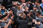 The San Antonio Spurs celebrate after defeating the Oklahoma City Thunder in the Western Conference finals of the NBA basketball playoffs series Saturday, May 30, 2026, in Oklahoma City