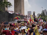 Venezuelan nationals protest against the official results that declared President Nicolas Maduro the winner of the July presidential election, in Mexico City, on Saturday.