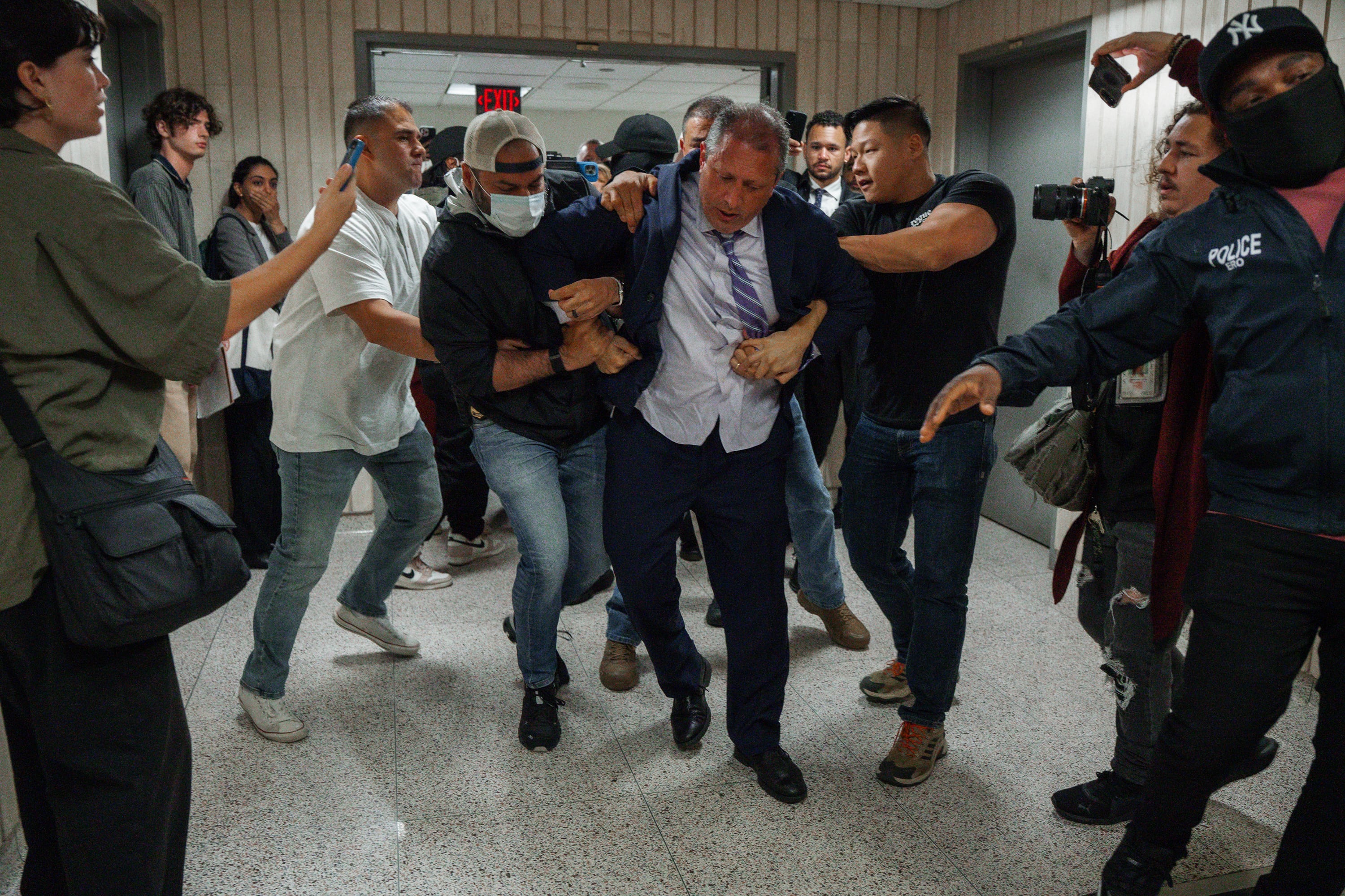New York City Comptroller Brad Lander is placed under arrest by Immigration and Customs Enforcement (ICE) and FBI agents outside federal immigration court on Tuesday, June 17, 2025, in New York.