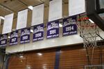 Championship banners hang above the Sunset High School gymnasium.