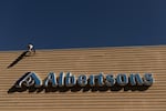 FILE - A sign for Albertsons grocery store is seen on Monday, Aug. 26, 2024, in Lake Oswego, Ore.