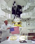 Each of the Voyager probes carries an American flag and a copy of a golden record that can play greetings in many languages.