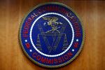 FILE - The seal of the Federal Communications Commission (FCC) is seen before an FCC meeting to vote on net neutrality, Dec. 14, 2017, in Washington. The FCC on Thursday, April 25, 2024 restored “net neutrality” rules that prevent broadband internet providers such as Comcast and AT&T from favoring some sites and apps over others.