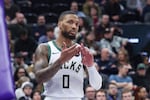 Milwaukee Bucks guard Damian Lillard reacts after a call against the Utah Jazz during the second half of an NBA basketball game, Monday, Jan. 27, 2025, in Salt Lake City.