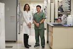 This photo from OHSU shows Paula Amato, M.D., professor of obstetrics and gynecology in the OHSU School of Medicine, and Shoukhrat Mitalipov, Ph.D., director of the OHSU Center for Embryonic Cell and Gene Therapy on Aug. 4, 2022.