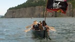 Members of the Portland All Nations Canoe Family pull 21 river miles on the fifth leg of their Canoe Journey from Beacon Rock to Washougal, Washington.