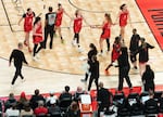 The Portland Fire team steps off to the side of the court for a timeout at the Moda Center in Portland, Ore., on July 9, 2026. The Portland Fire played the Las Vegas Aces, losing 88-80.