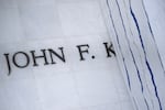 A tarp covers signage on the facade of the Kennedy Center in Washington, D.C,, on June 15, 2026, after a judge ordered the removal of President Donald Trump's name from the building.