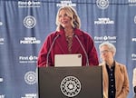 WNBA Portland owner Lisa Bhathal Merage speaks at a groundbreaking ceremony for a new joint WNBA-NWSL training facility as Oregon Gov. Tina Kotek looks on, Tuesday, April 22, 2025, in Hillsboro, Ore.