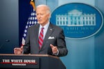 President Biden speaks during a news conference in the Brady Press Briefing Room at the White House on Friday. Biden made a surprise appearance, his first in the briefing room since becoming president, to tout a positive job report and take questions from reporters.