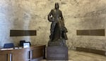 A bronze Marcus Whitman statue in the Washington State Capitol building weighs over 9,000 pounds with its stone base.