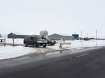 Federal Bureau of Investigation vehicles obstruct to entrance to the Burns airport Monday, Jan. 11, 2016.