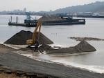 Barges delivered sand used to cap the river sediment ladened with creosote from the McCormick & Baxter site.