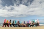 An effort called One More Hour, created by the Foundation for Social Connection and the dating app Hinge, invests in groups where people can find friends — like this surfing club for women of color in Los Angeles called Intrsxtn Surf.